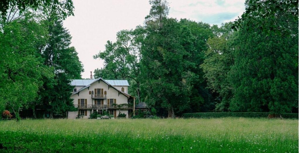 Main residence of the Grand Geneva estate in mature parkland